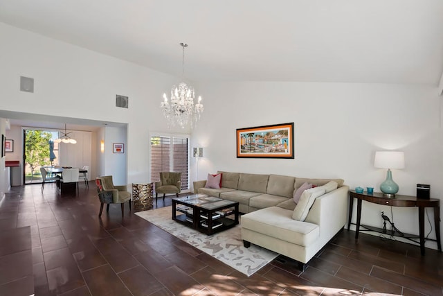 living room with a notable chandelier, dark hardwood / wood-style flooring, and high vaulted ceiling