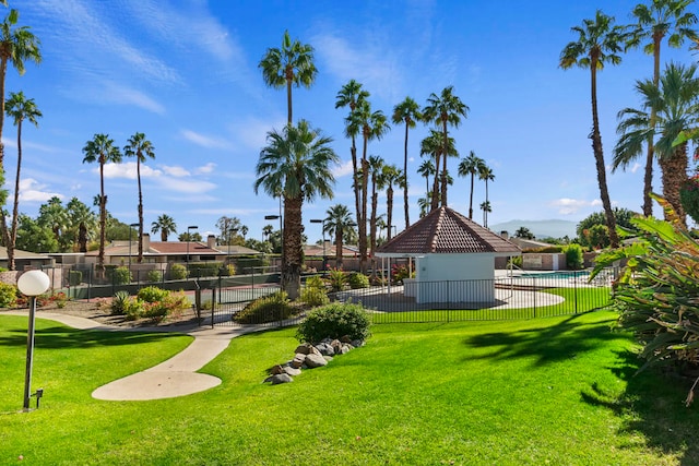 surrounding community featuring a lawn