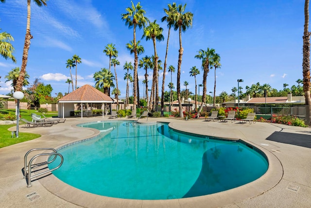 view of pool featuring a gazebo and a patio area