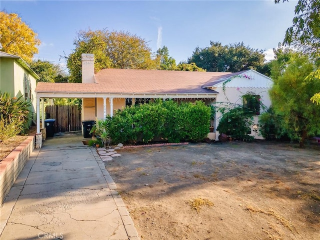 view of front of house featuring a carport