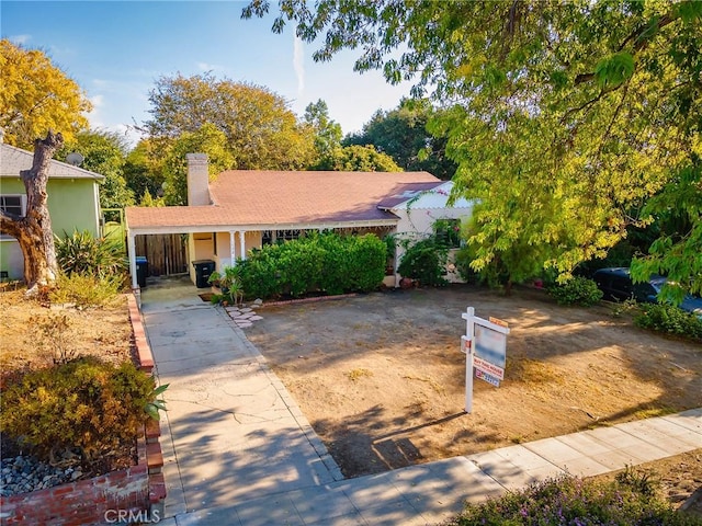 view of front of house featuring a carport