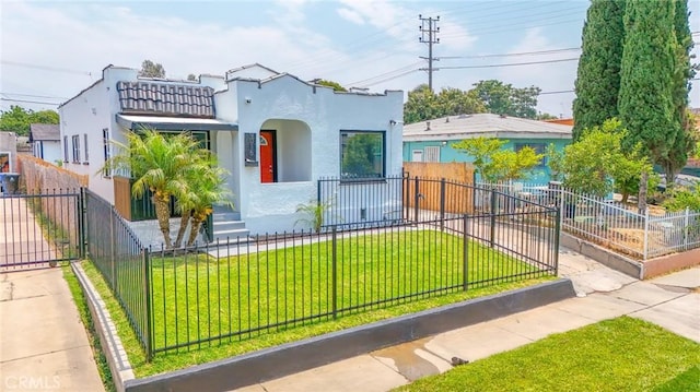 view of front of home with a front yard