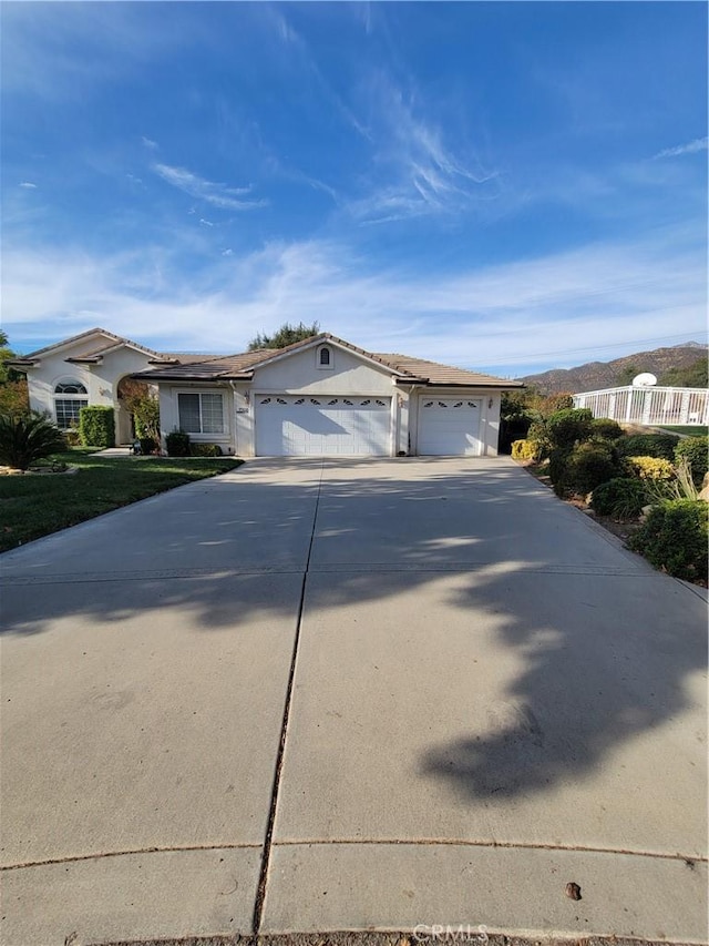 ranch-style house with a garage