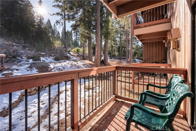 view of snow covered deck