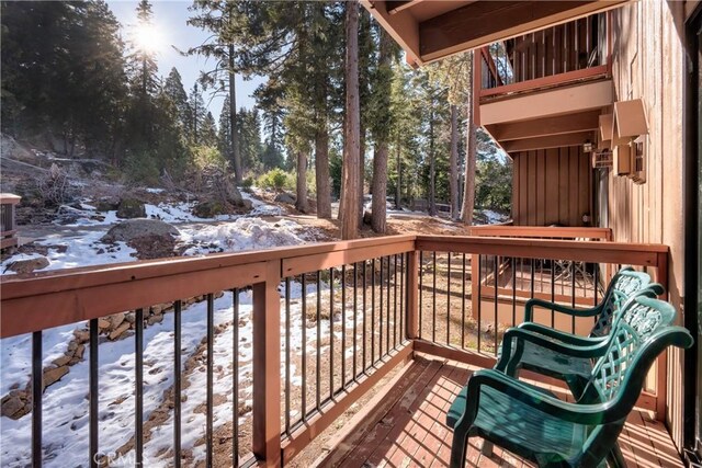 7540 Henness Cir Unit B101, Yosemite, CA 95389 - snow covered deck featuring view of scattered trees