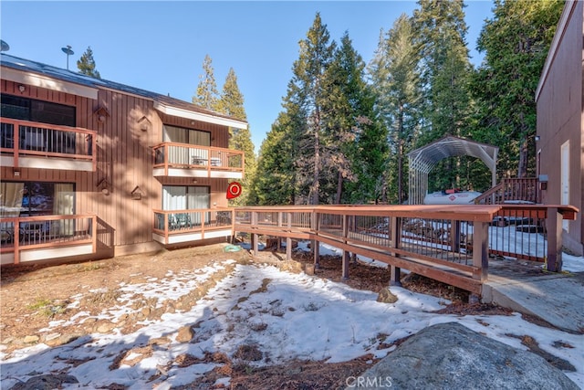 view of snow covered deck