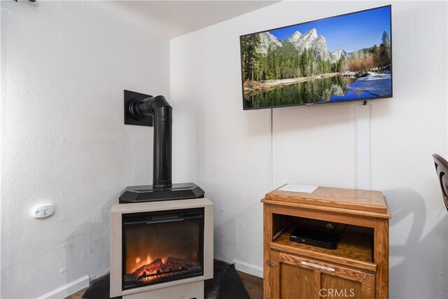 7540 Henness Cir Unit B101, Yosemite, CA 95389 - detailed view of a wood stove and baseboards
