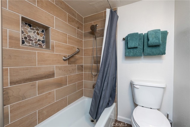 bathroom featuring shower / bath combination with curtain and toilet