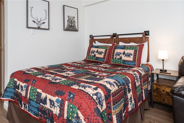 bedroom featuring wood-type flooring