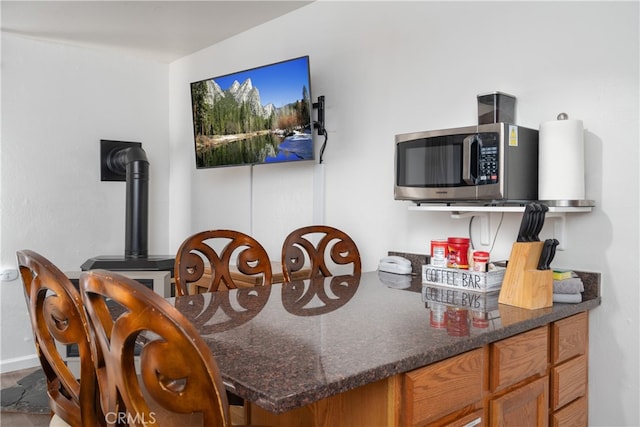 interior space with dark stone counters