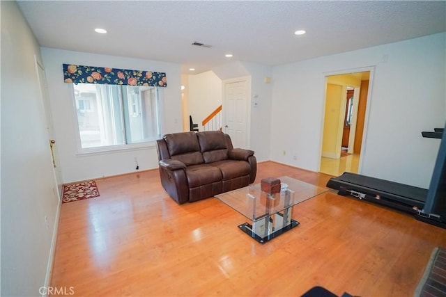 living room with hardwood / wood-style floors