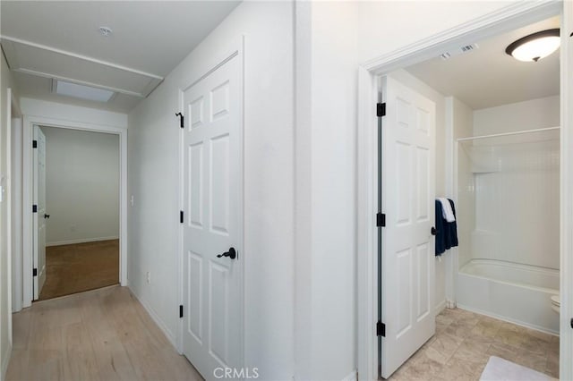 hallway featuring light wood-type flooring