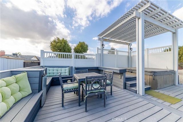 wooden deck featuring a hot tub, an outdoor hangout area, and a pergola