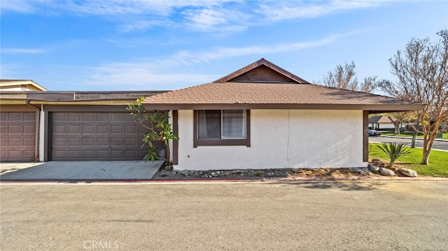 single story home with a garage