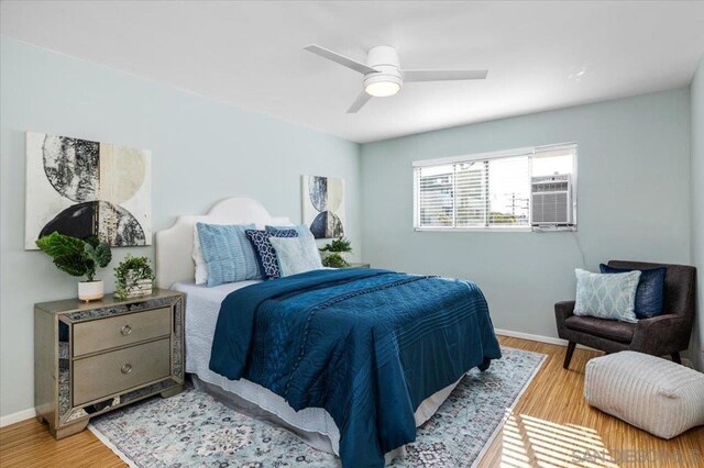 bedroom featuring light hardwood / wood-style flooring and ceiling fan