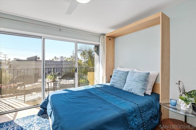 bedroom featuring access to exterior and ceiling fan