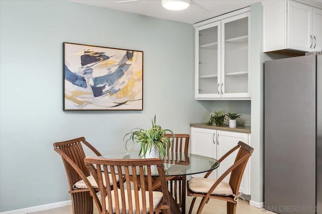 dining room with light tile patterned floors