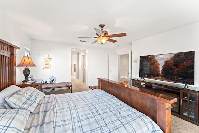 carpeted bedroom with ceiling fan