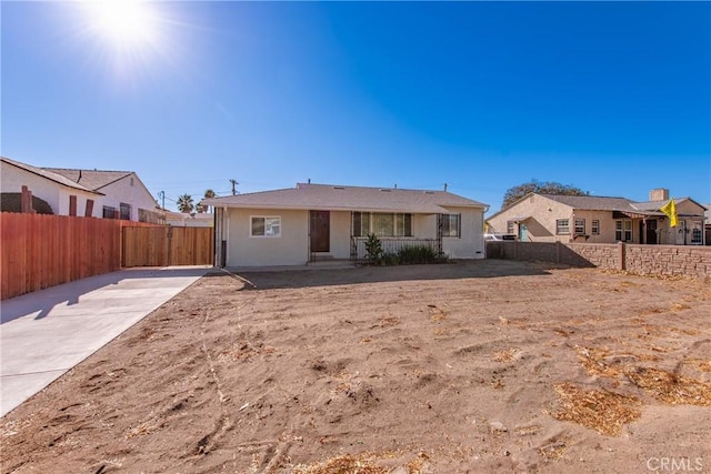 back of property with a patio area