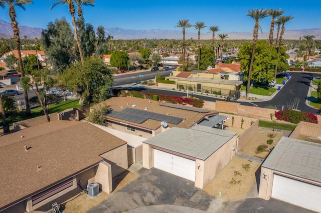 birds eye view of property featuring a mountain view