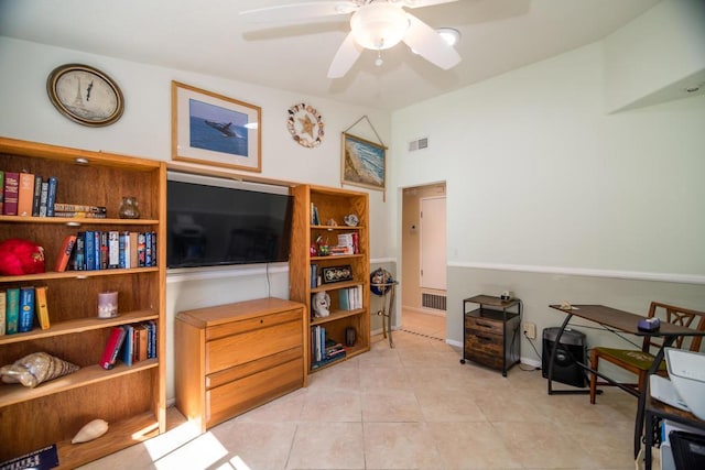 interior space featuring ceiling fan