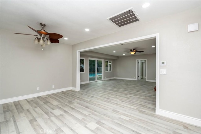 unfurnished living room featuring light hardwood / wood-style flooring