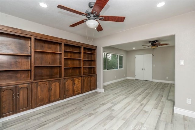 unfurnished living room featuring light hardwood / wood-style floors