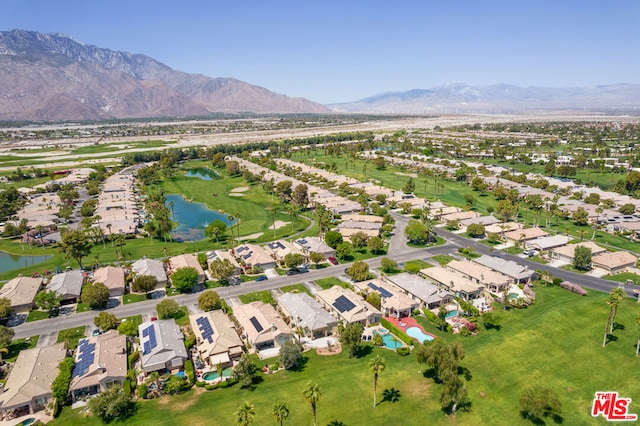 bird's eye view featuring a water and mountain view