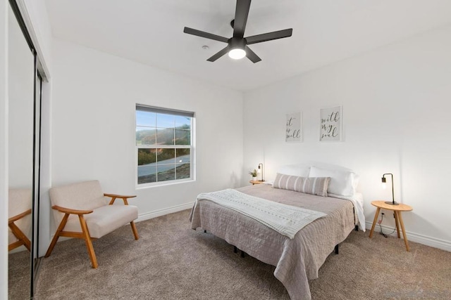 bedroom with carpet floors, a closet, and ceiling fan