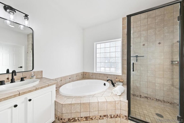 bathroom with vanity and plus walk in shower