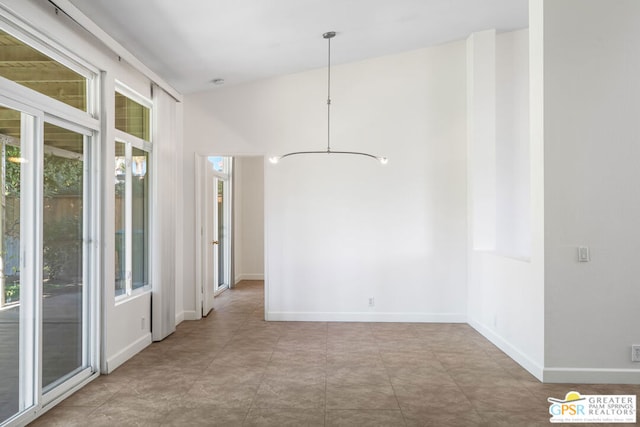 spare room with a wealth of natural light