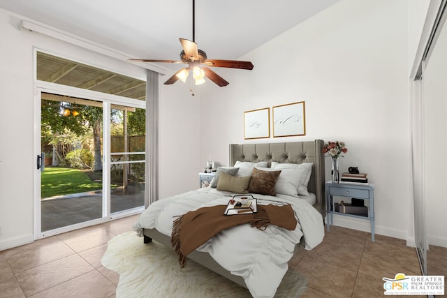 tiled bedroom featuring access to outside, ceiling fan, and vaulted ceiling