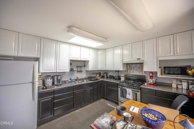 kitchen featuring white cabinetry, sink, and stainless steel appliances