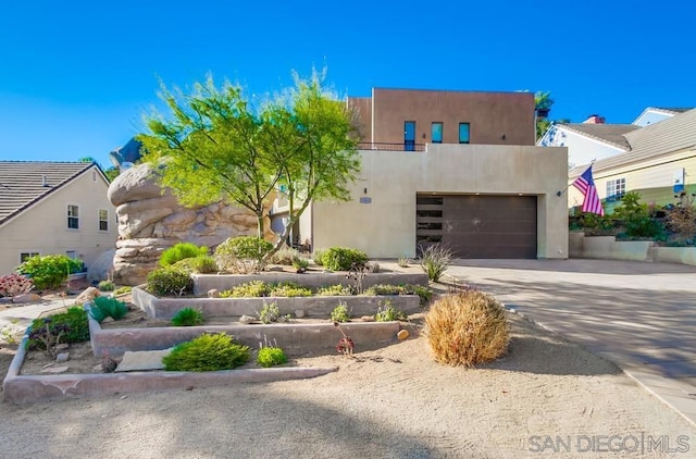 southwest-style home with a garage