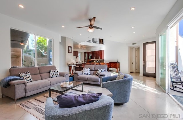 living room featuring ceiling fan