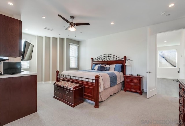 carpeted bedroom featuring ceiling fan