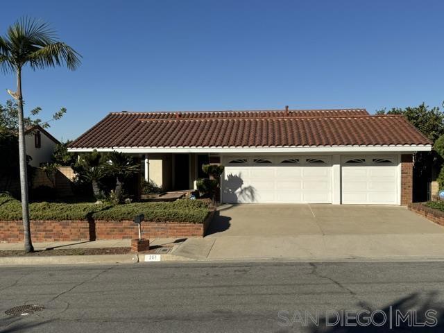 view of front of property with a garage