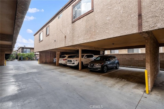 view of parking with a carport