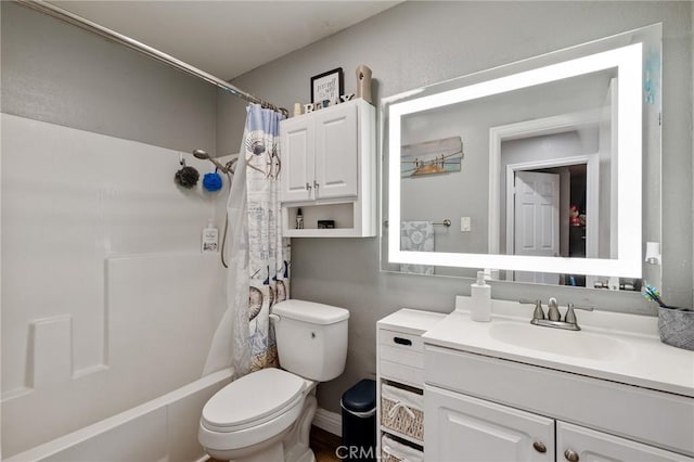 full bathroom with shower / bath combo, vanity, and toilet