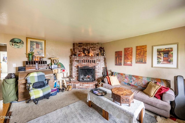 carpeted living room featuring a fireplace