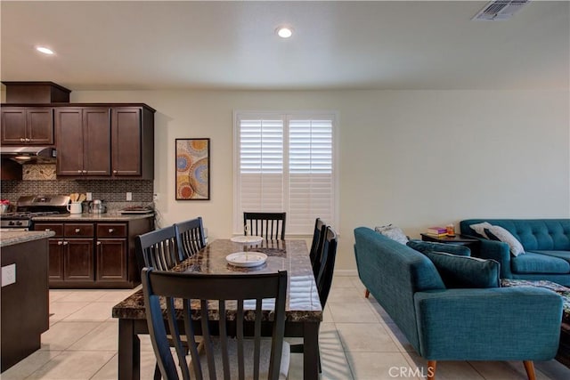 dining area featuring light tile patterned floors, visible vents, and recessed lighting