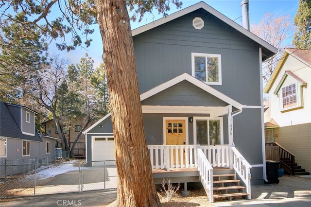 view of front of home featuring a garage and an outdoor structure