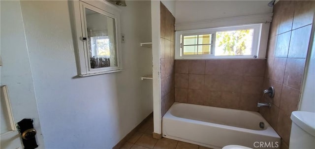 full bath featuring tile patterned floors and toilet