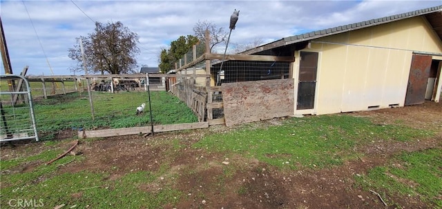 view of yard with an outdoor structure and exterior structure