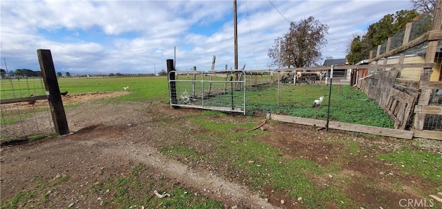 view of yard featuring a garden and fence