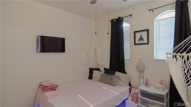 bedroom featuring ceiling fan