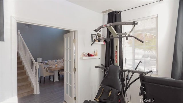 exercise area featuring dark hardwood / wood-style floors