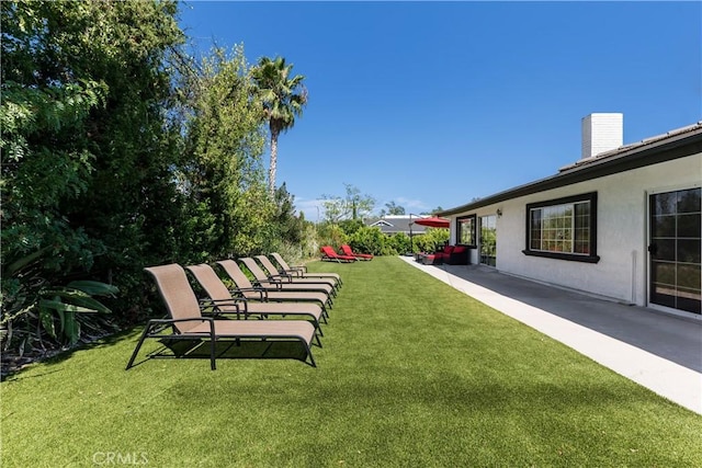 view of yard with a patio