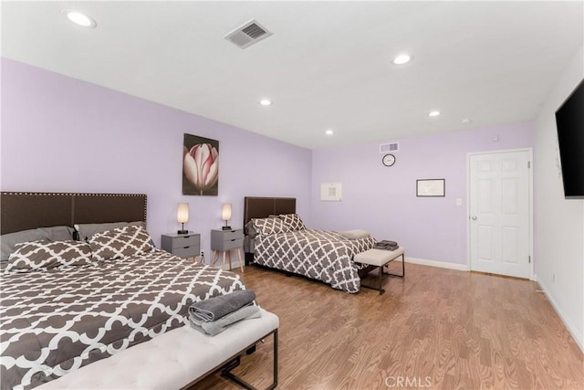 bedroom featuring light hardwood / wood-style floors