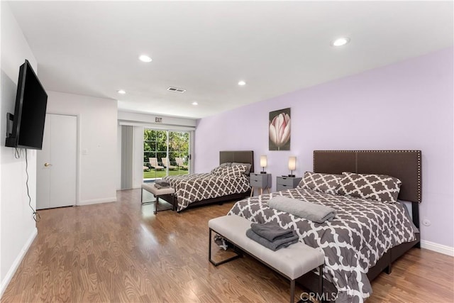 bedroom featuring hardwood / wood-style floors